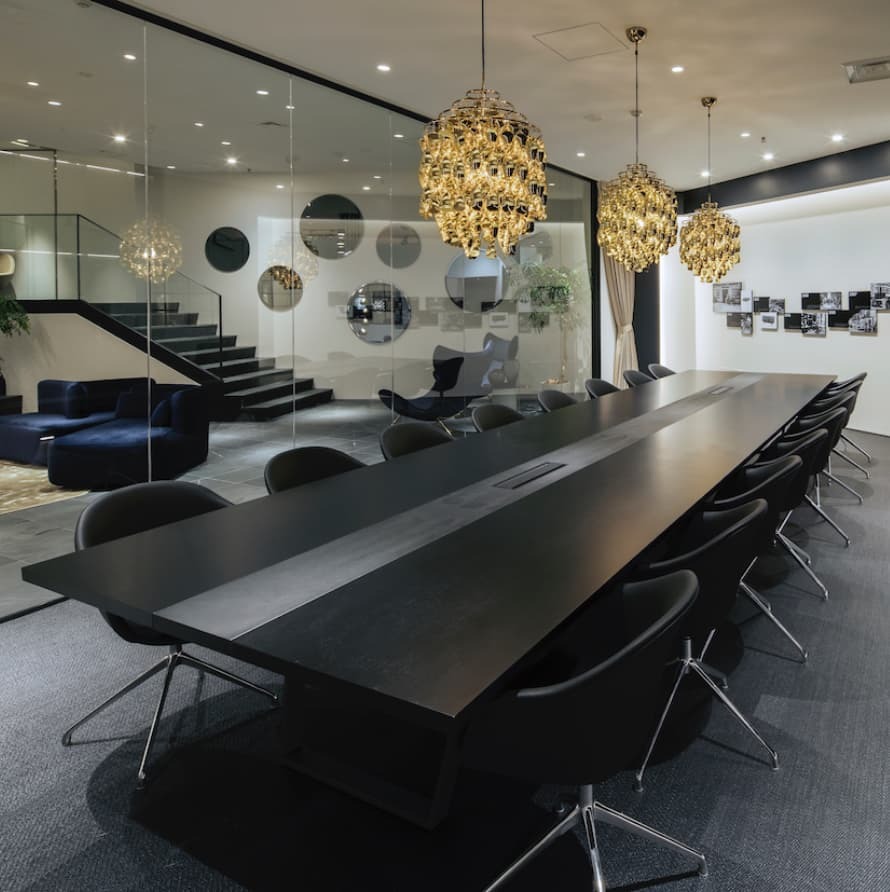 Business room stuff with longue black Boconcept table